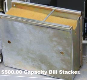 Stacker holds $500.00 in $1.00 bills.